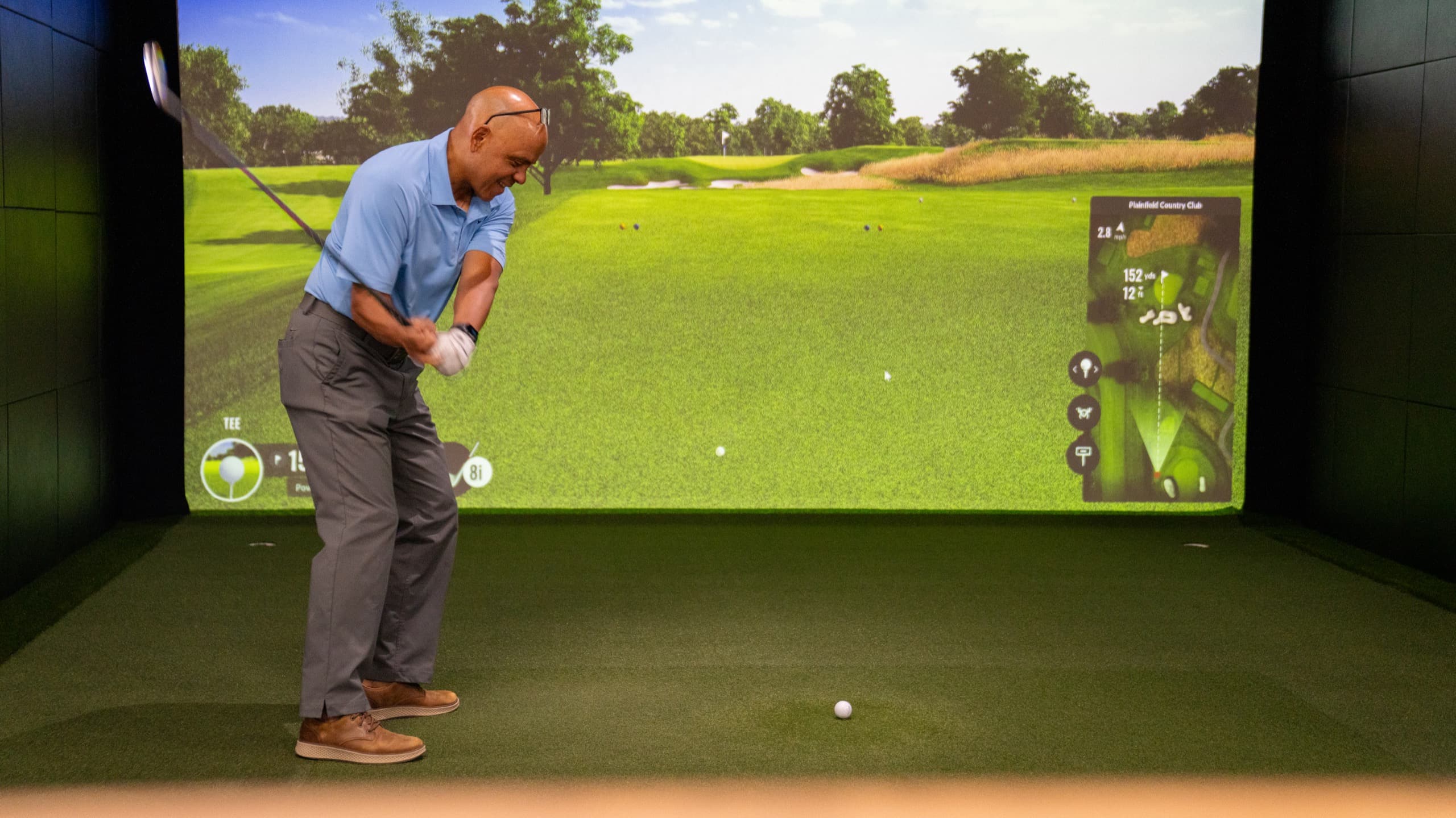 Jorge Diaz, PGA in the private simulator bay at Unbound Golf in Branchburg, NJ