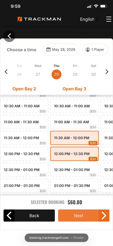 Trackman mobile time slot picker with orange selected slots for a one-hour booking